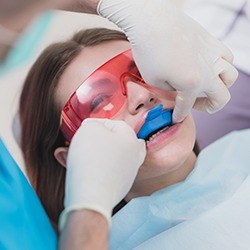 woman getting fluoride treatments