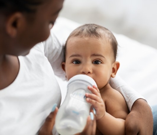 Baby drinking from a bottle