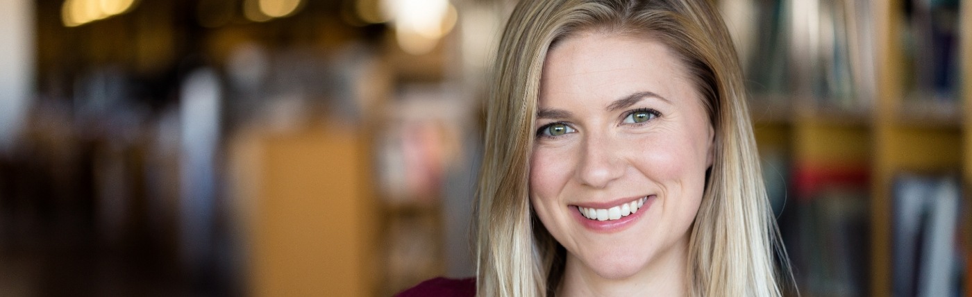 Blonde woman smiling after visiting cosmetic dentist in Waco