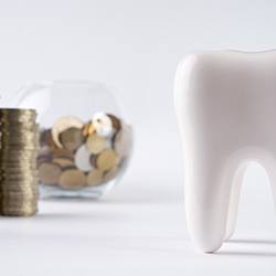 Money next to a tooth