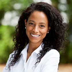 Confident smiling woman with dental implants in Waco