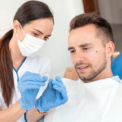 Man at dentist getting Invisalign in Waco