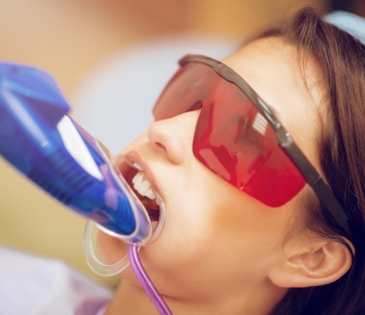 Dental patient having fluoride applied to their teeth