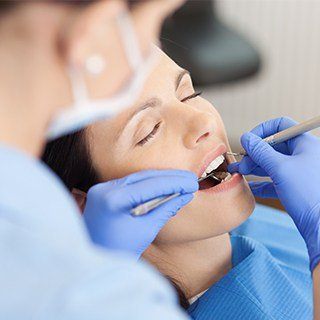 woman sedated getting work done