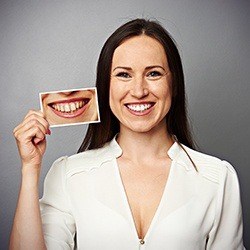 woman holding smile before
