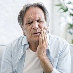 older man with jaw pain