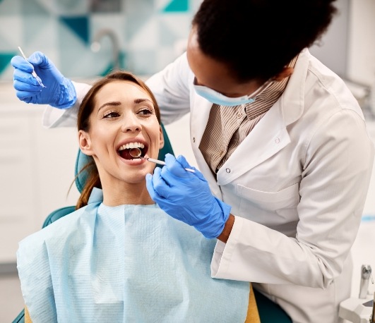 Woman receiving a dental exam
