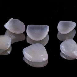 Multiple veneers in Waco, TX on black table