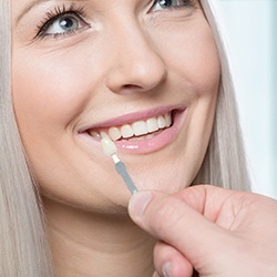 Color-matching woman’s smile for veneers in Waco, TX