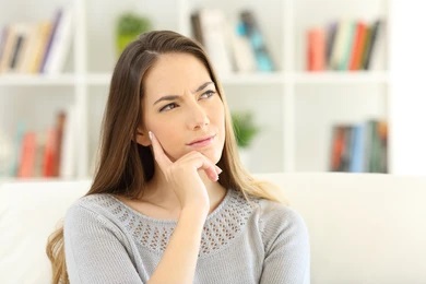 person wondering if they can get cavities during Invisalign