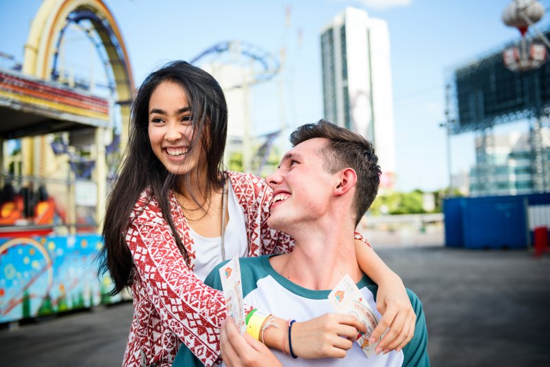 Couple on a date while the girl wears Invisalign